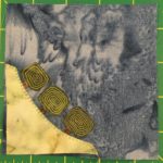 This quilt block shows a grassy coerner int he bottom left with some short bushes/trees on it. The bushes/trees have very short brown trunks and green tops with a spiral thread stitched around inside.