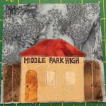 In this quilt block we have another light orange building bearing the words,