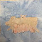 This quilt block shows a bunch of pigs against a blue background. In the center of the block is a light skin colored large sow lying on her side. Underneath the sow are six pink piglets curled up and suckling on her. There are little curly-q tails at the end of each. On the sow's back is single pig facing the camera with his little two front legs visible. His face is drawn in with a black pen.