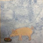 This quilt block shows a large pig standing in front of a rubber bin with food in it. The food is a mixture of black pen, orange and yellow fabric. The pig is a light tannis-pink piece of fabric with a pink stitched outing. The outline shows its leg muscles, its ears, and its little curly tail. This is all against a blue salmon-patterned background.